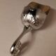 Sugar and sugar shovel in golden silver metal