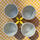 Four mugs decorated with Villeroy and Boch butterflies