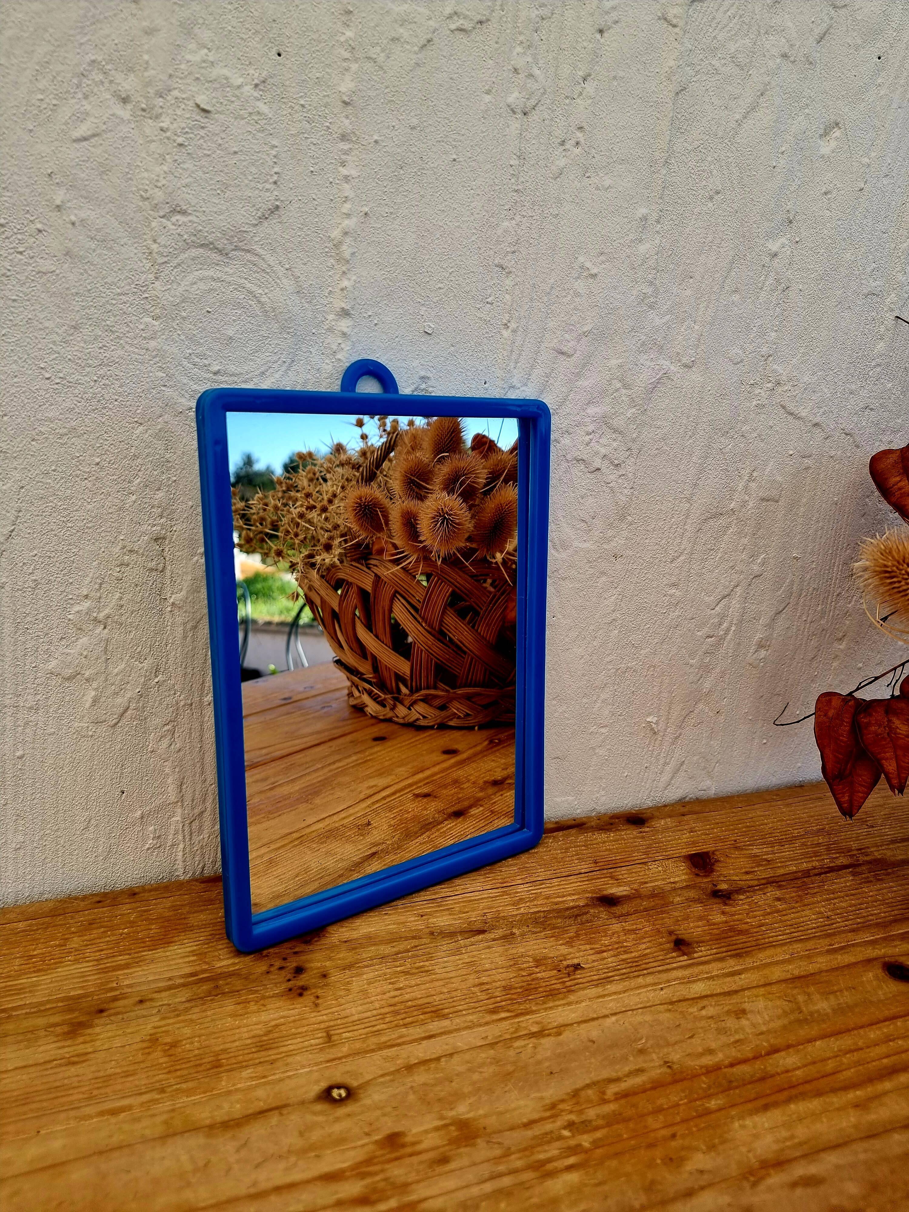 Vintage blue barber mirror
