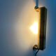 Small simple cylindrical brass wall light from the mid-century, 1950s, Germany.