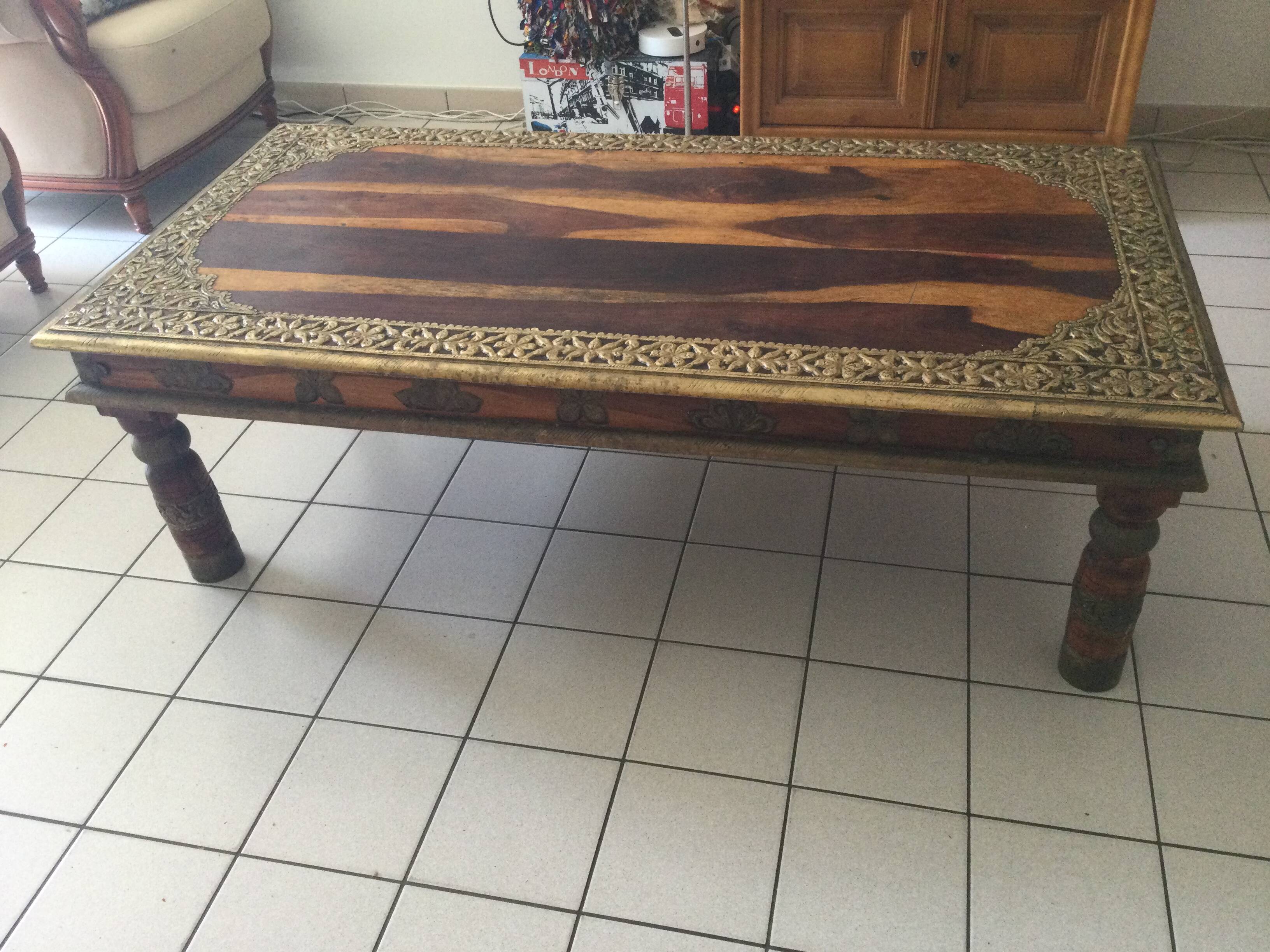Large vintage Indian coffee table made of solid sheesham wood and brass.