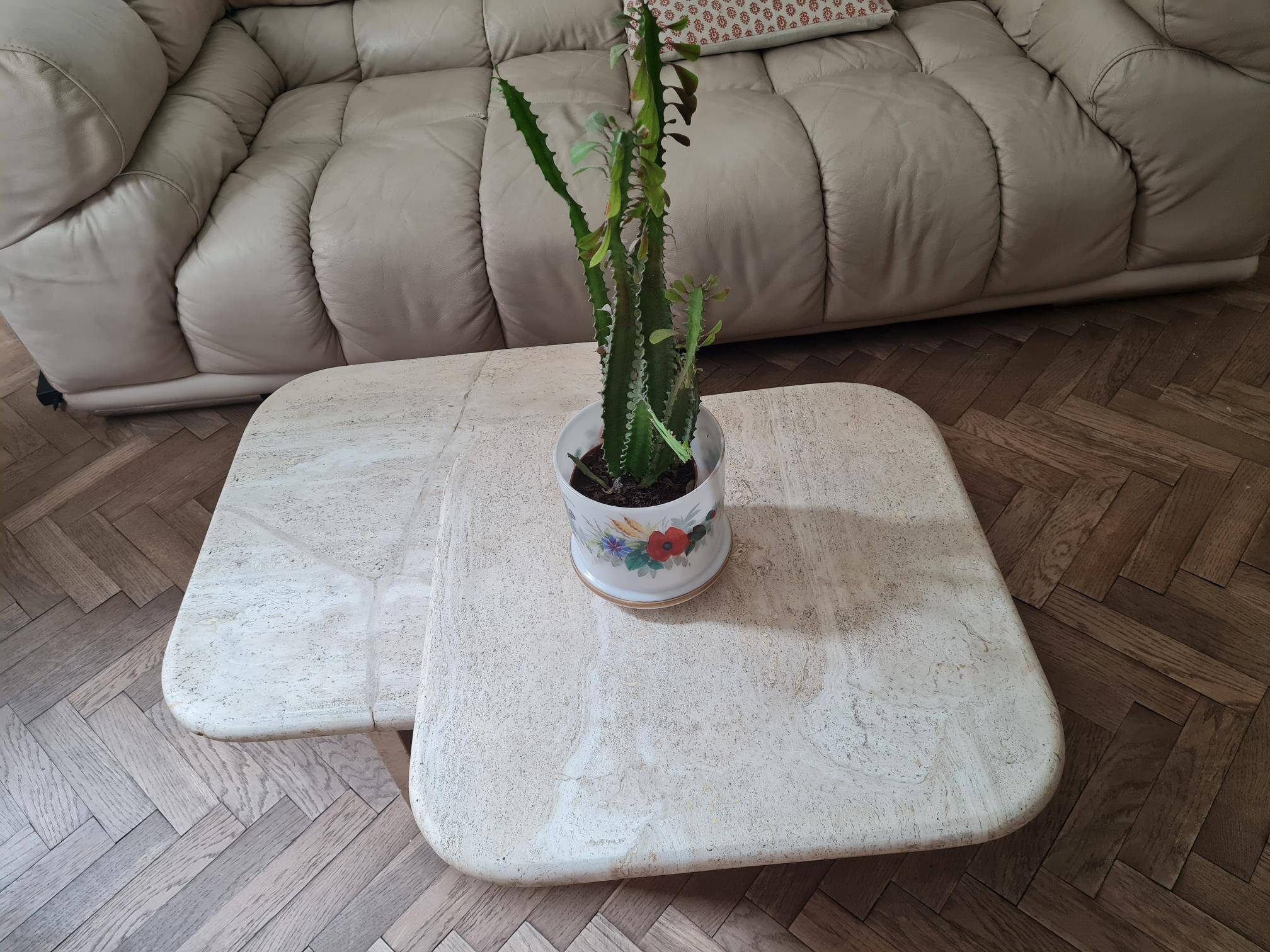 Pair of travertine nesting tables