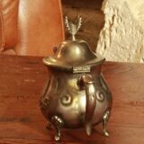 Old teapot with eagle