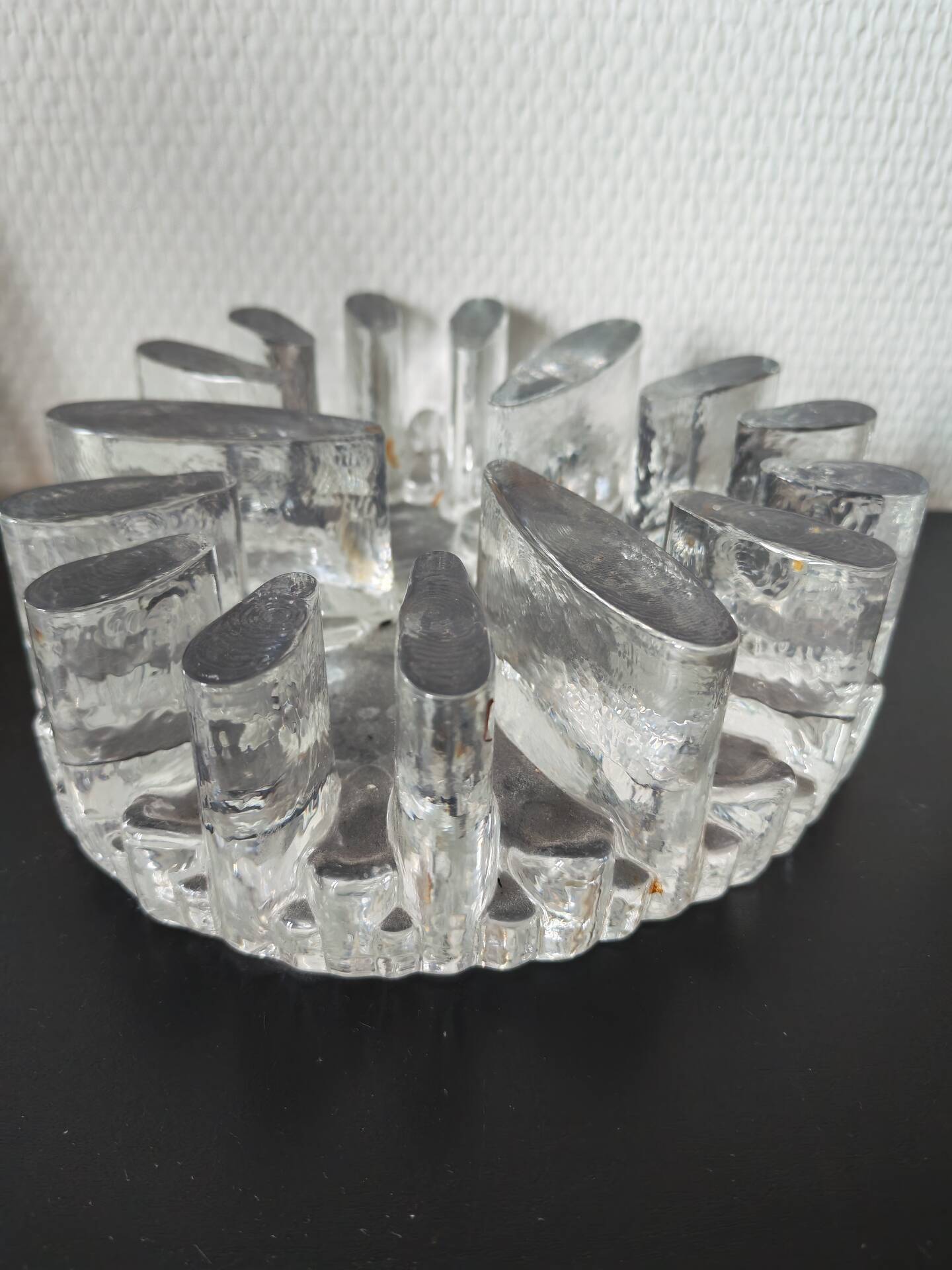 Large glass candle holder in iceberg brutalist style.