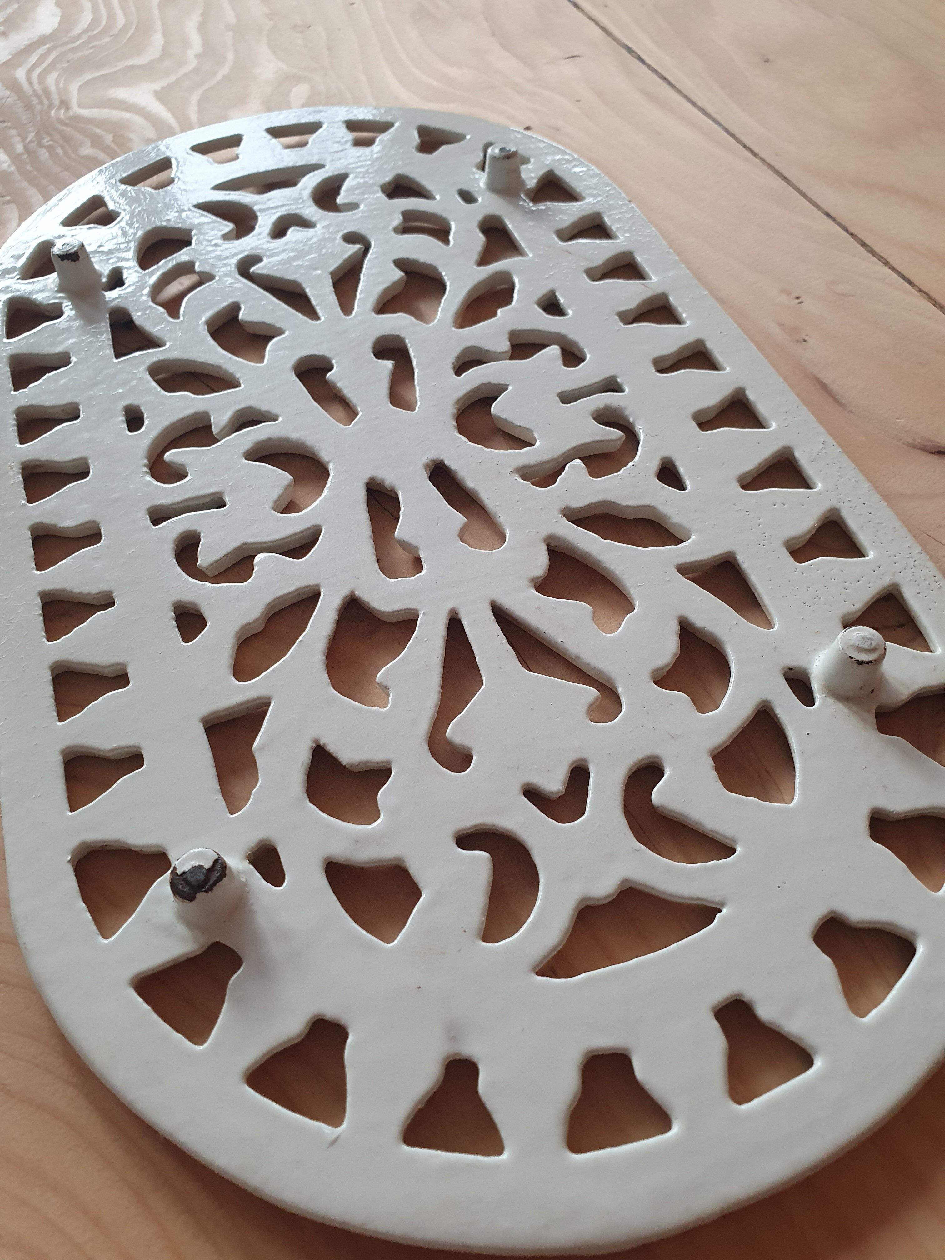 Dessous de plat en fonte