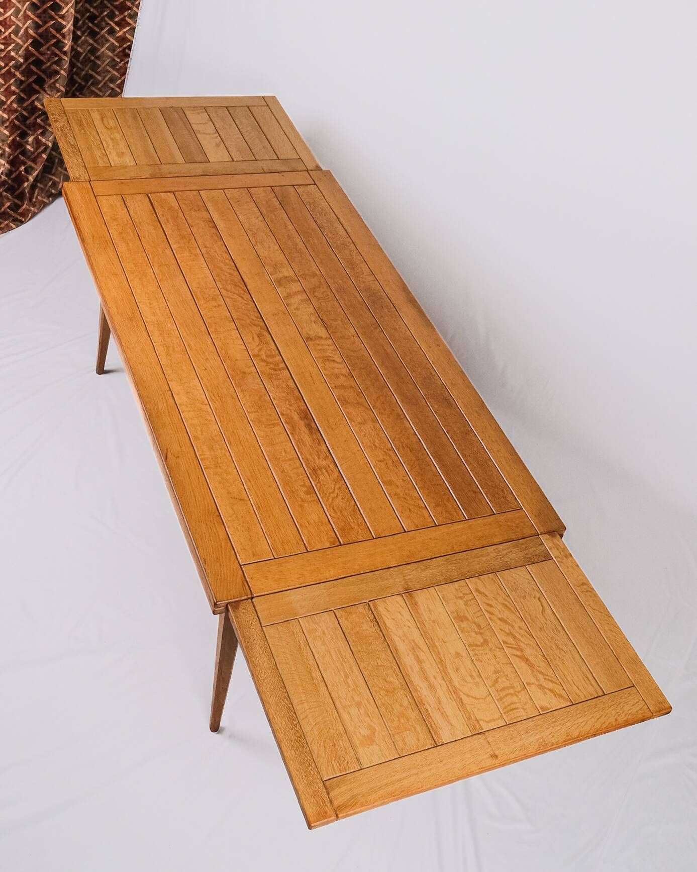Extendable oak table in the style of Guillerme and Chambron, France 1960s
