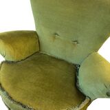 Vintage moss green cocktail chair with fringes.