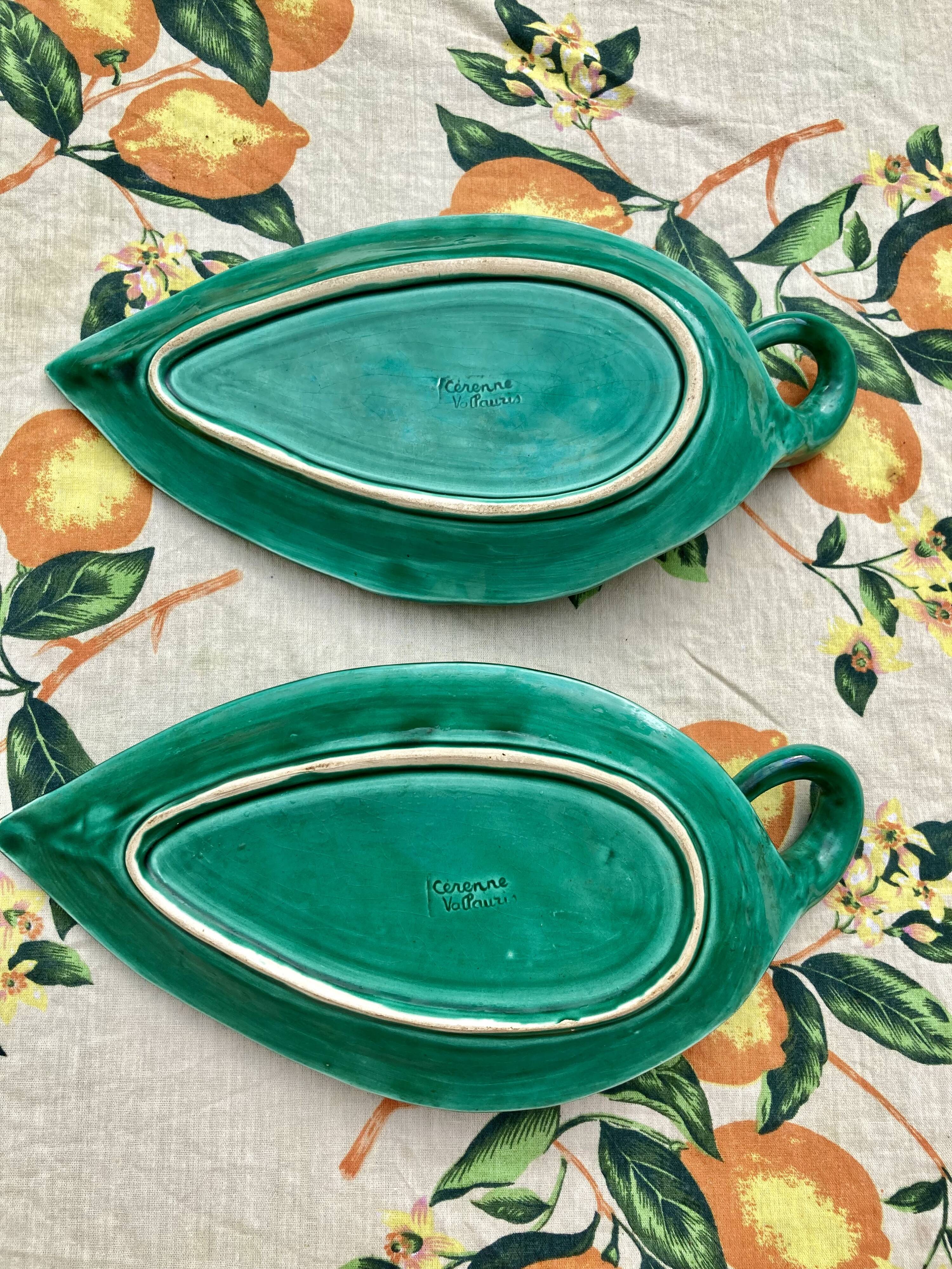 Duo of Vallauris raviers in the shape of green leaves signed Cérenne