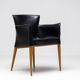 Set of four Vela leather armchairs by Carlo Bartoli - Italian modern elegance.