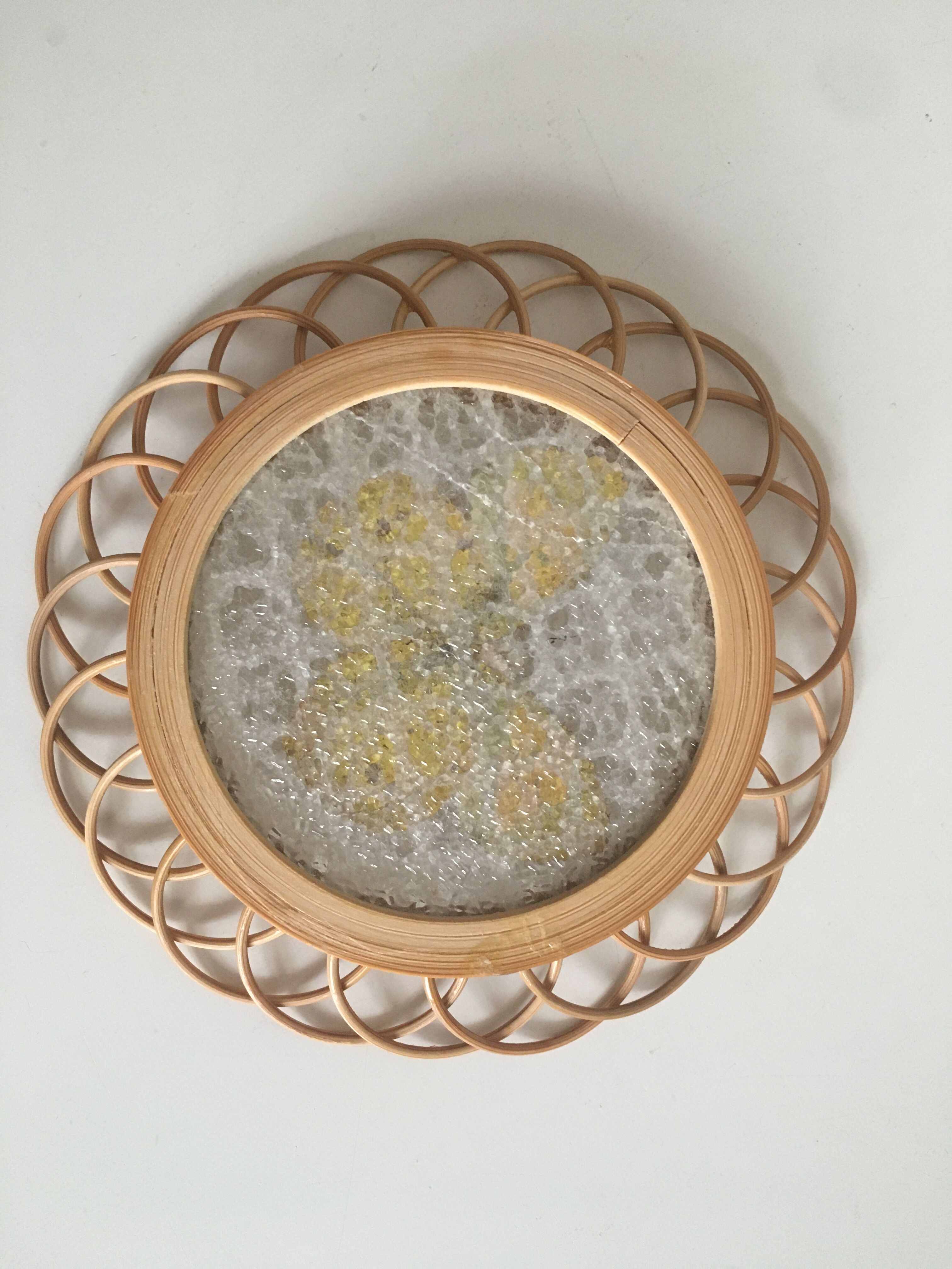 Rattan under glasses with butterflies in bamboo display