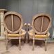Pair of Louis XVI style medallion armchairs