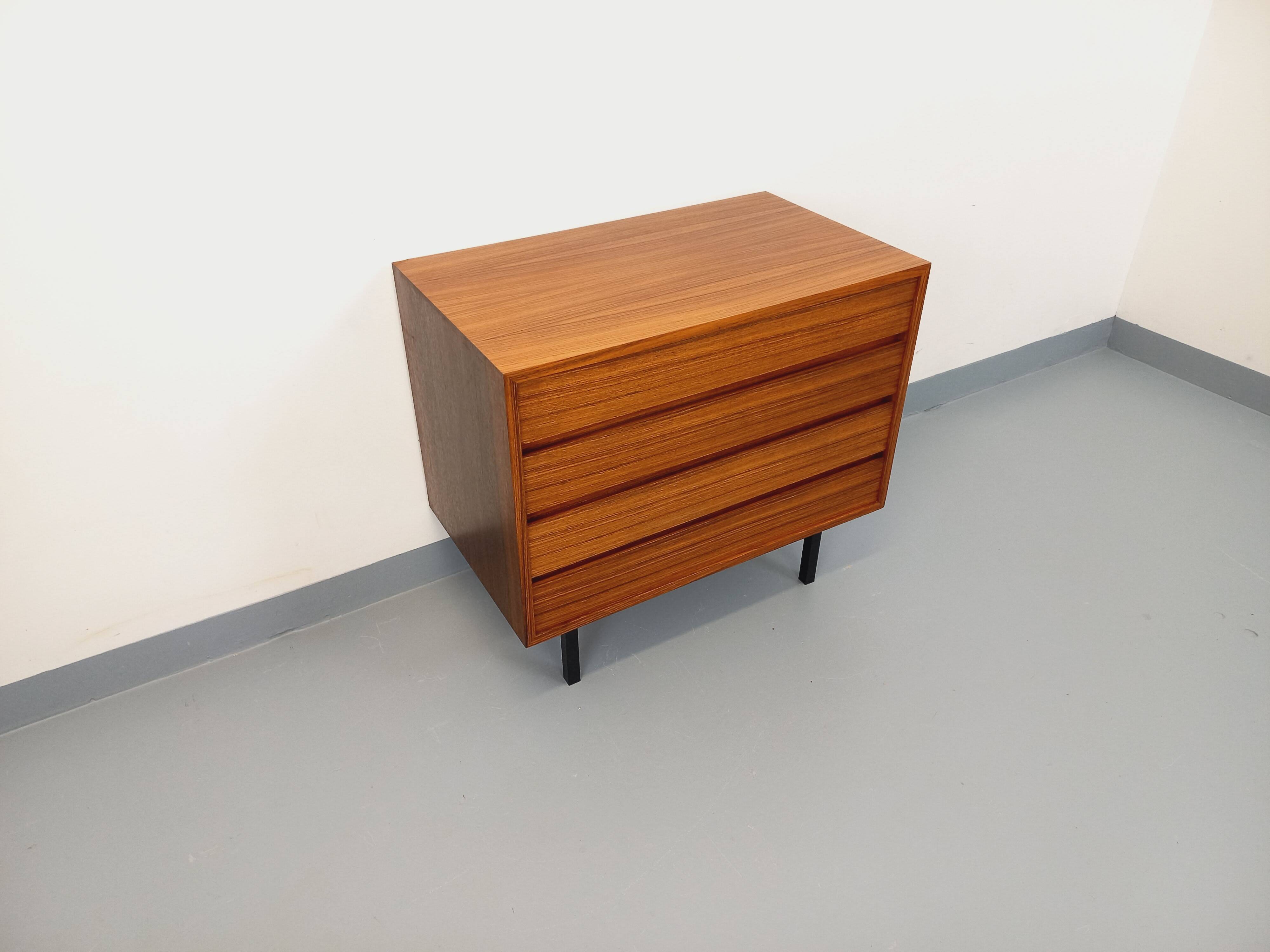 Vintage Scandinavian modernist chest of drawers in rosewood and black metal.