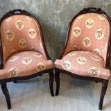 Pair of carved solid mahogany gondolas from the 19th century