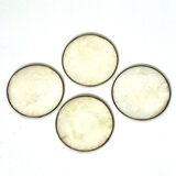 Under mother-of-pearl glasses