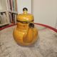 Vintage orange porcelain coffee pot by Boch, model Palma.