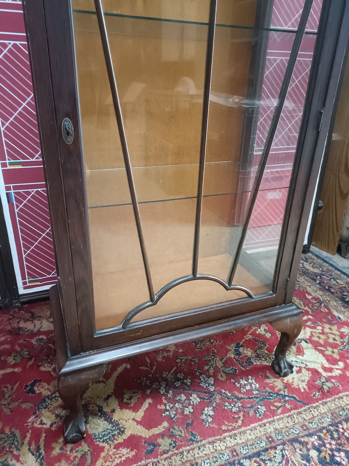 English glazed display case, lion paw feet