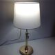 Lampe en laiton, abat-jour en tissu vert pastel, style art deco