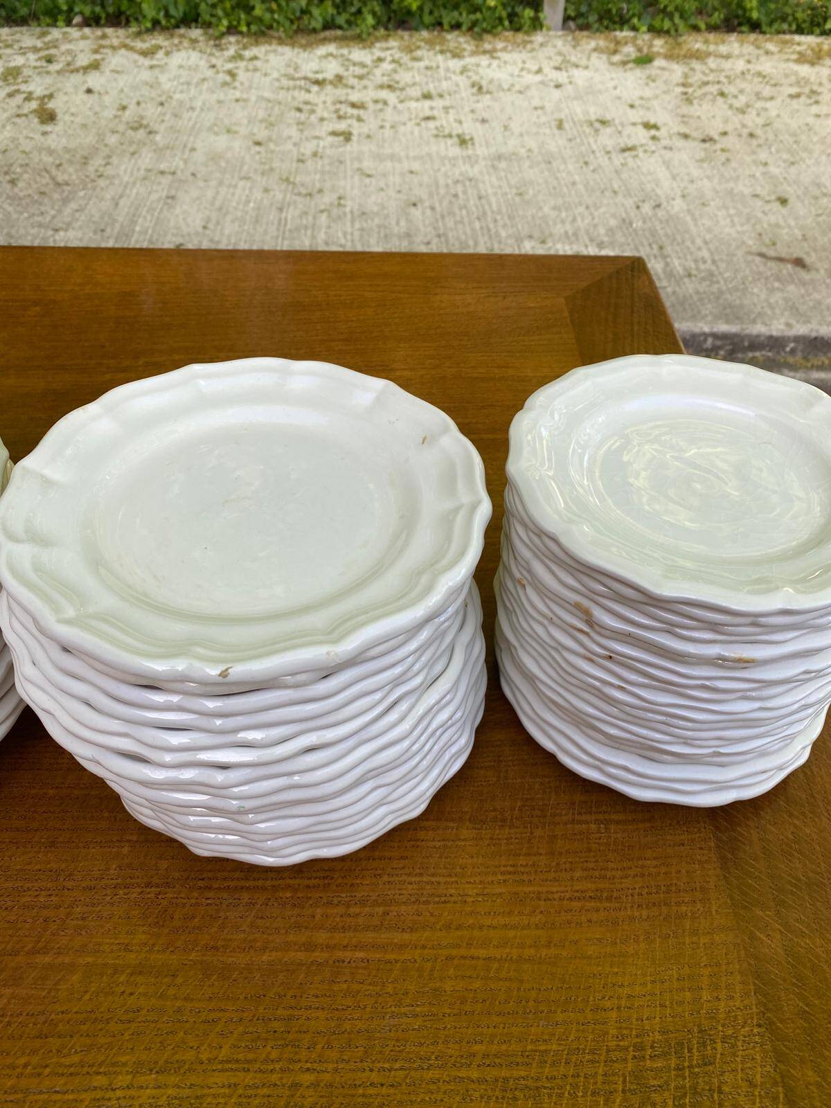 Service of 84 vintage white porcelain plates.