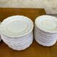 Service of 84 vintage white porcelain plates.
