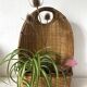 Woven rattan basket, for placing or hanging.
