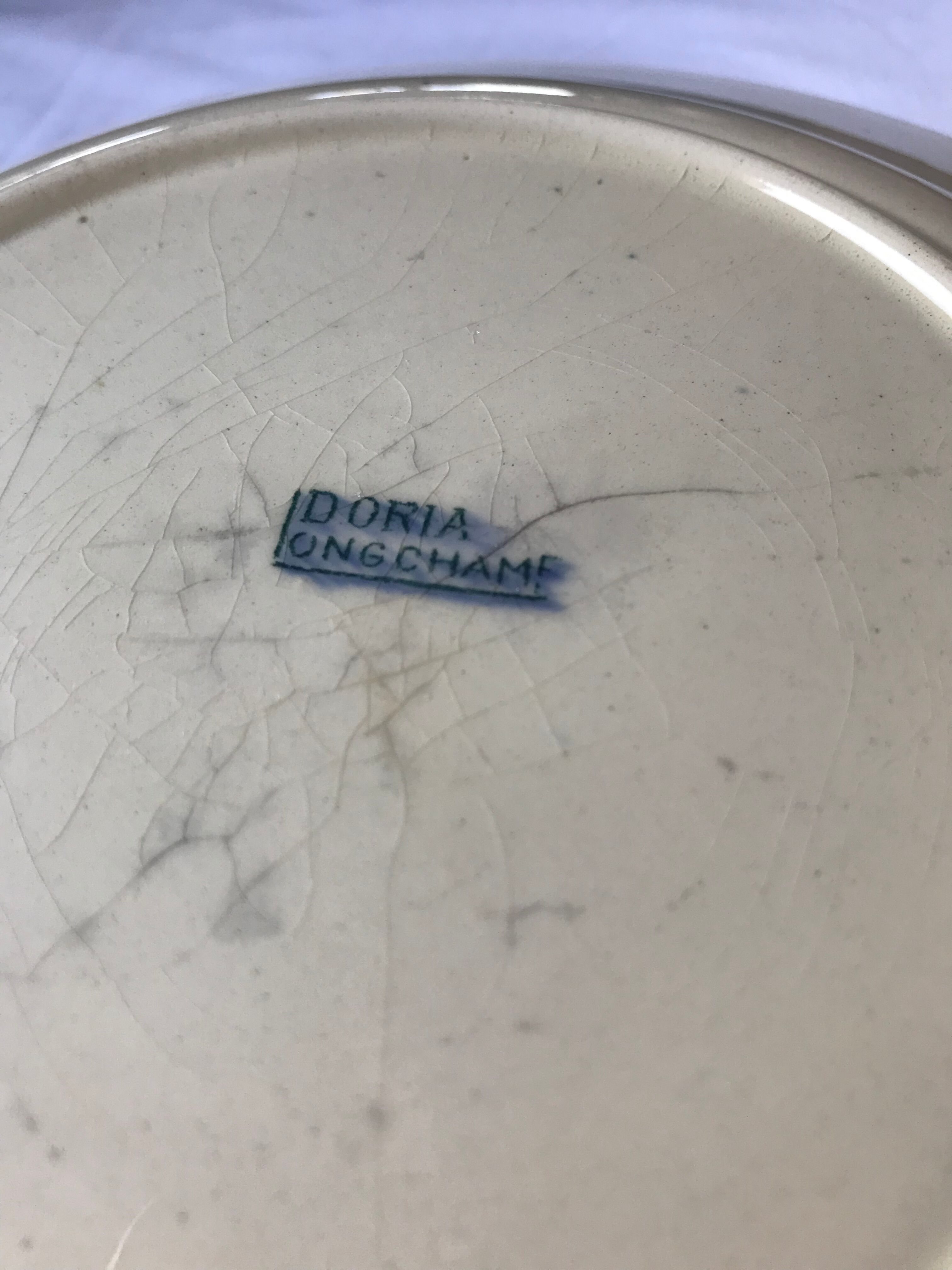 Flat plate of the longchamp earthenware factory, doria model,  iron land