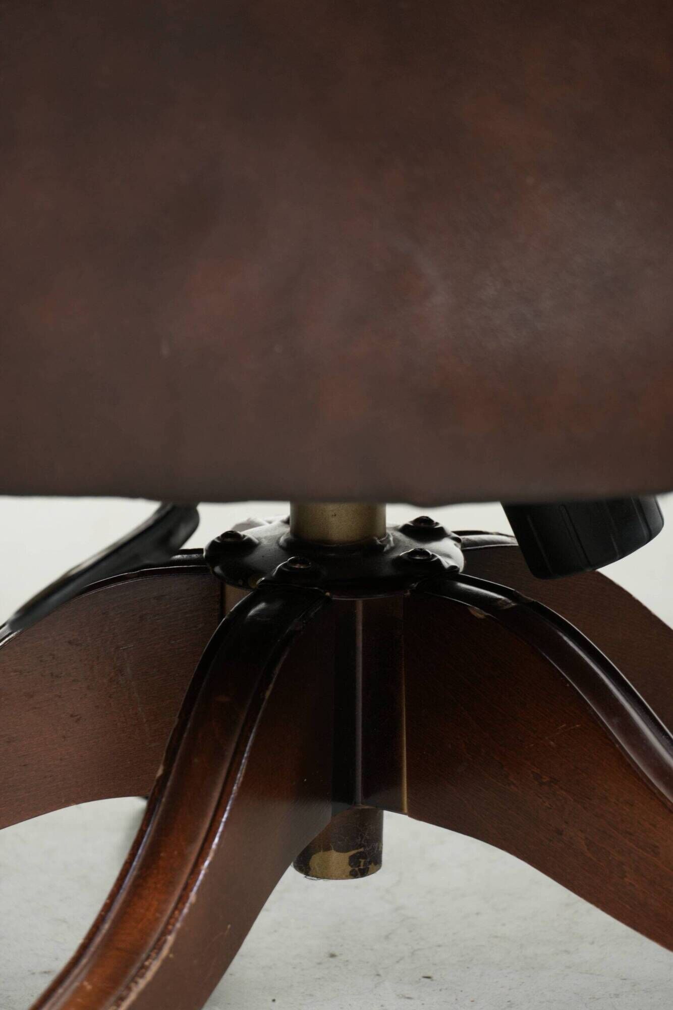 Brown cow leather Chesterfield office chair on wheels in English style