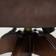 Brown cow leather Chesterfield office chair on wheels in English style