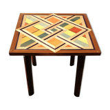 Wooden table with geometric decoration