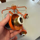Suspension cascade design Space age orange vintage from the 70s.
