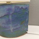 Sculptural table lamp in blue glaze with an abstract expression.