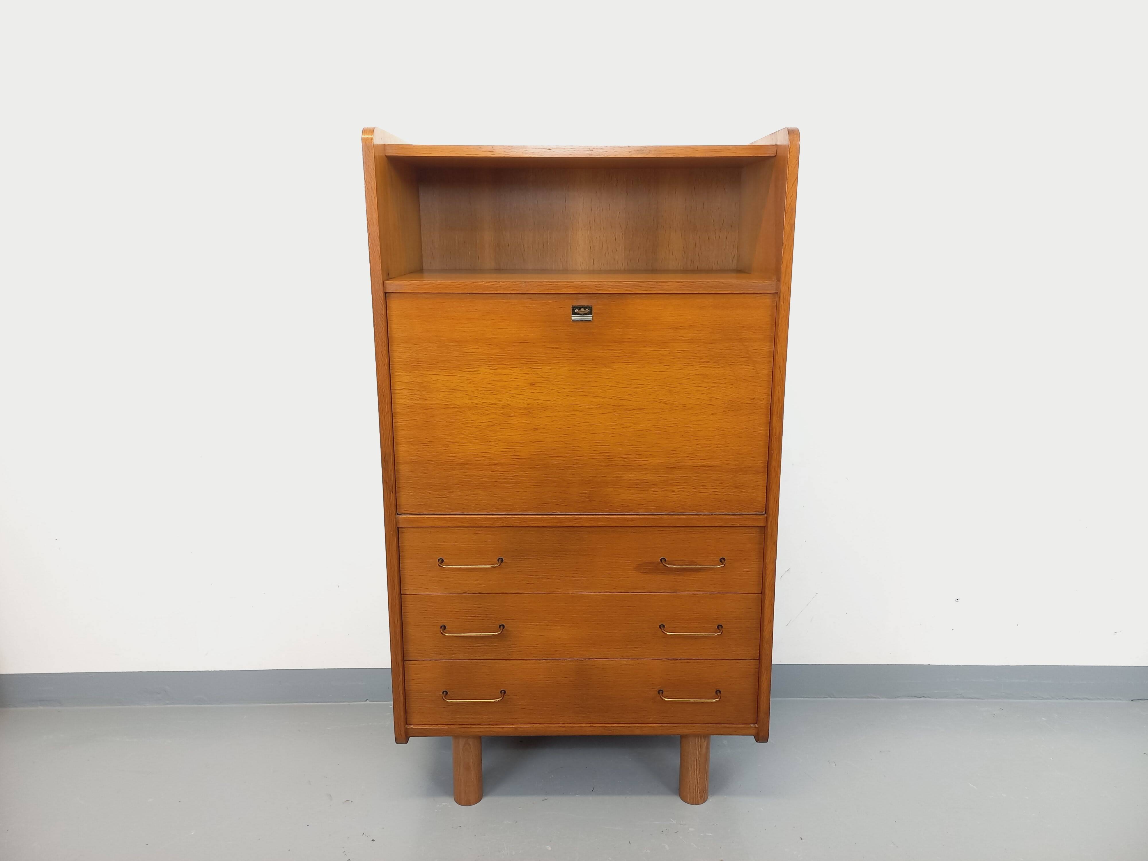Vintage oak secretary storage furniture from the 1950s and 60s.