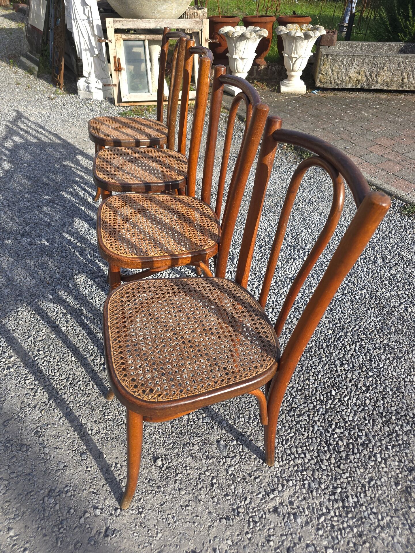 4 chaises de bistrot en bois courbé et cannage