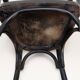 Curved black lacquered wooden armchair in Thonet style