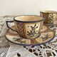 Antique Quimper Henriot earthenware cups and saucers