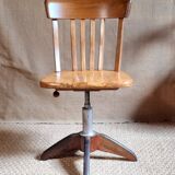 Height-adjustable rotating workshop office chair