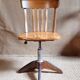 Height-adjustable rotating workshop office chair