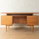 1960s walnut veneer desk with drawers and cabinet