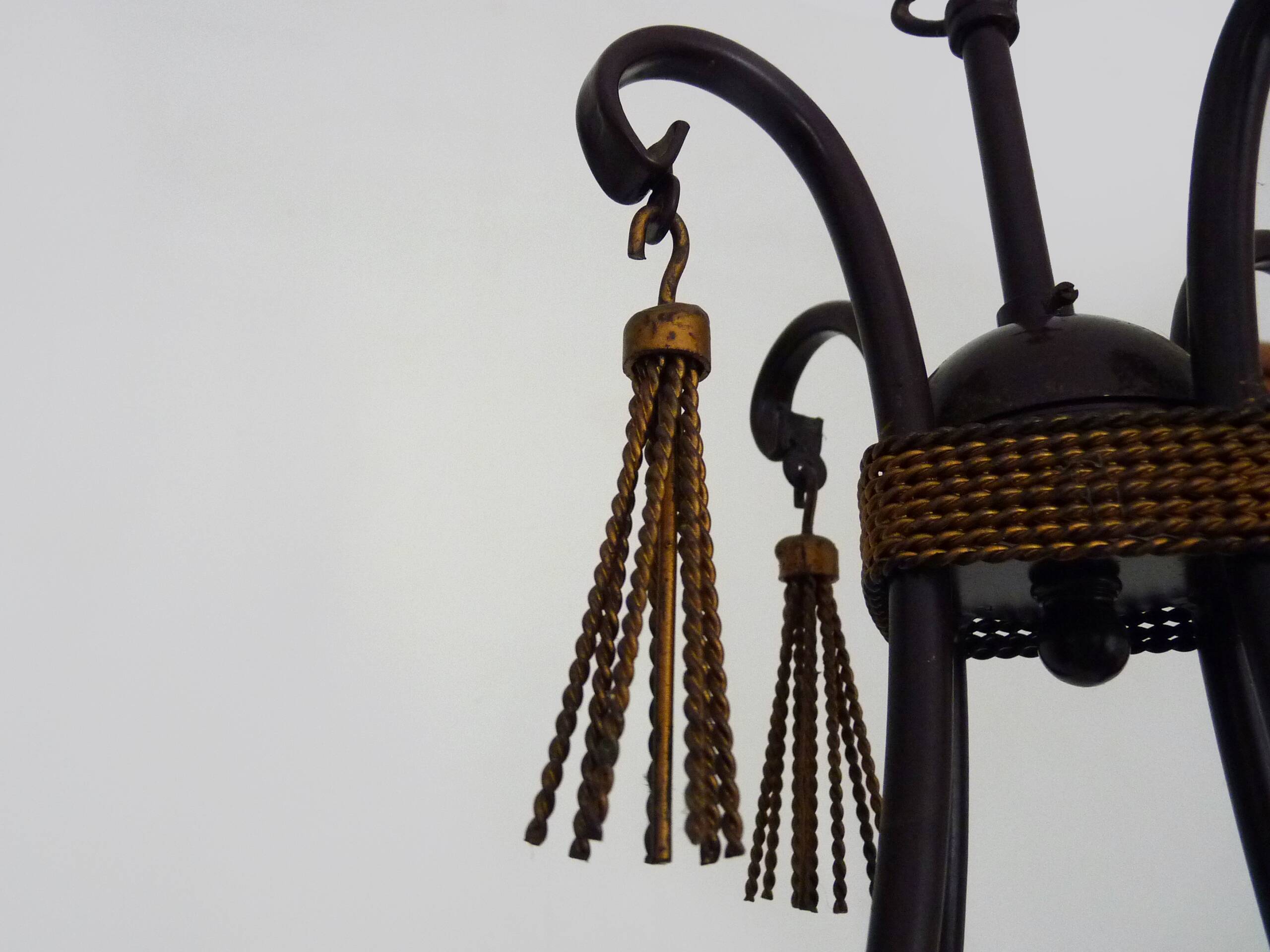 Vintage 4-arm, 4-light chandelier from the 1980s. Brown and gold metal.