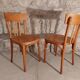 Pair of honey-colored bistro chairs