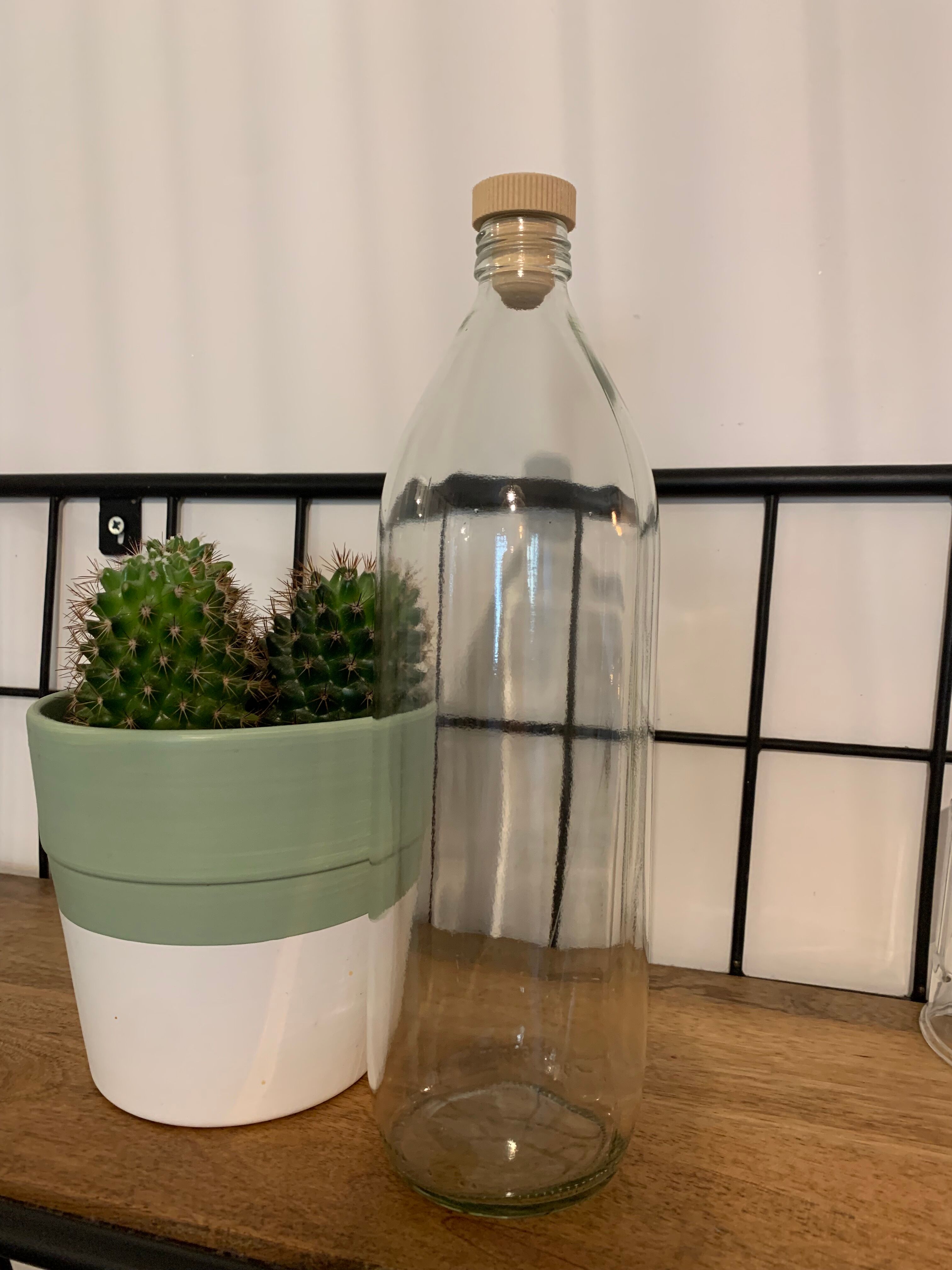 Antique glass bottle with a capacity of 1 litre and its beige cap - in very good condition!