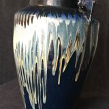 Ceramic vase glazed with two triangular handles