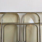 Four Plia folding chairs by Giancarlo Piretti edited by Castelli