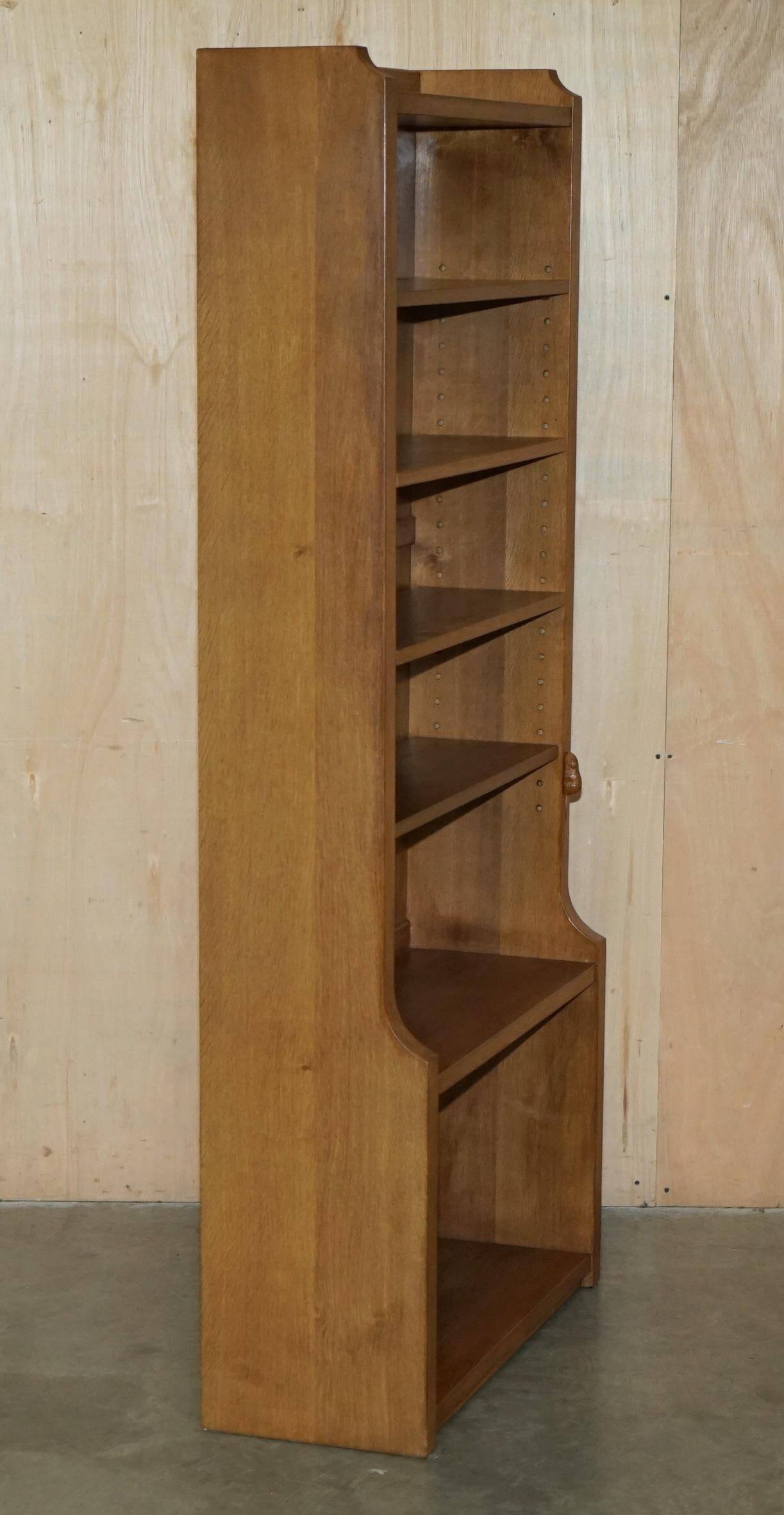 Pair of Robert Mouseman Thompson oak carved bookshelves.