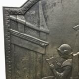 Fireplace plate "reading girl in front of the fire"
