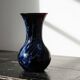 Large vintage purple art glass vase with silver glitter inclusions.