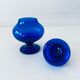 Blue glass apothecary shaped bottle