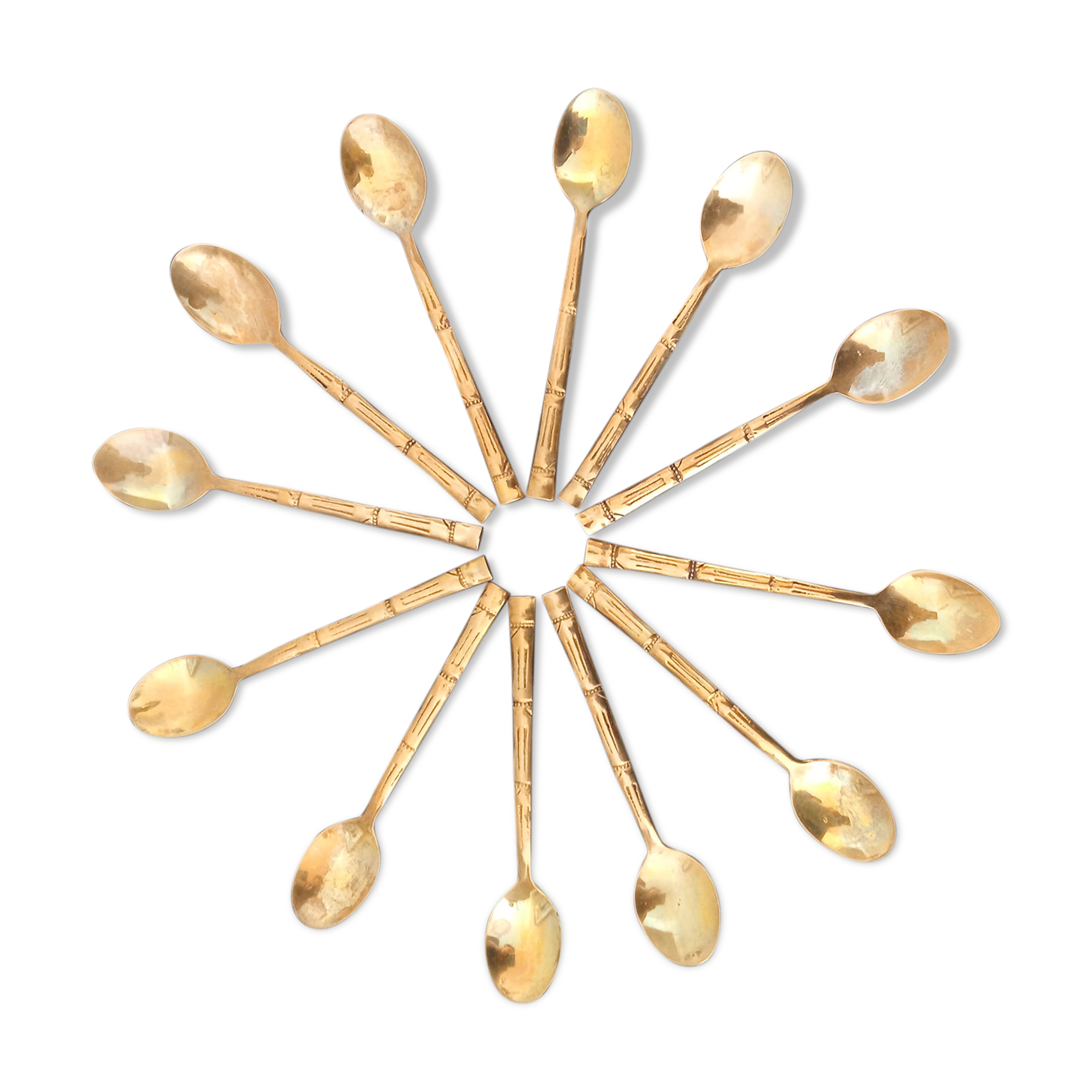 Set of 12 old brass teaspoons