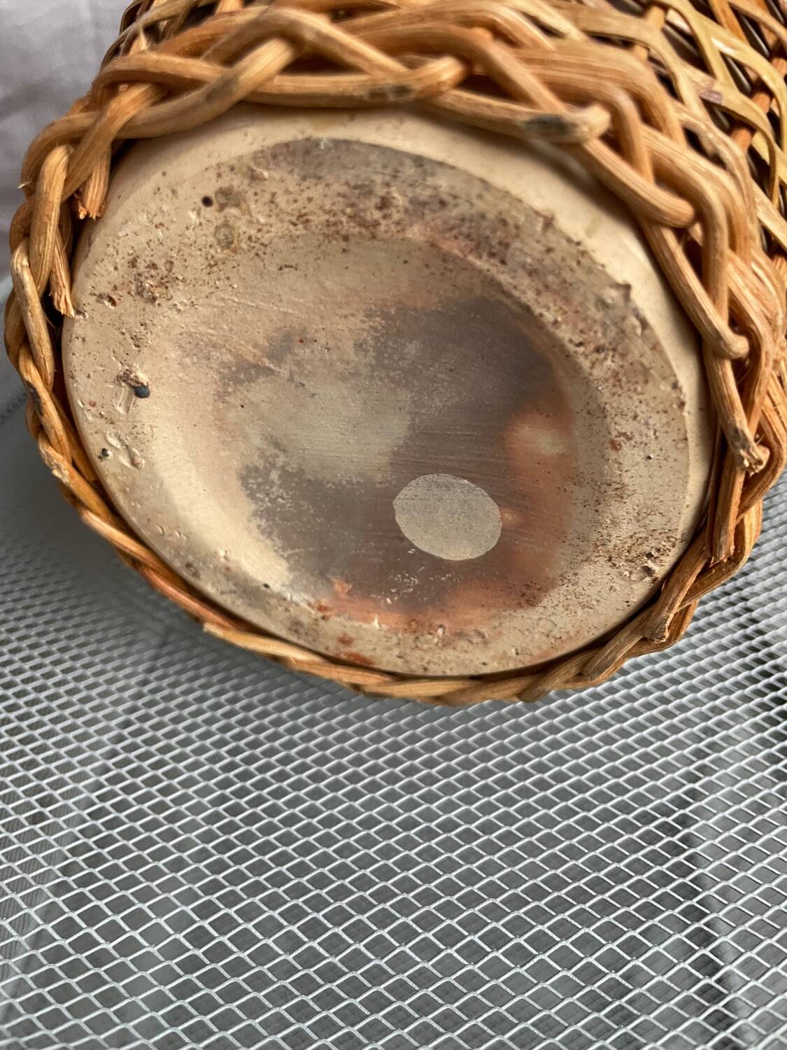 Vintage stoneware and rattan vase