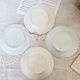 4 mismatched vintage porcelain and earthenware flat plates Marina set