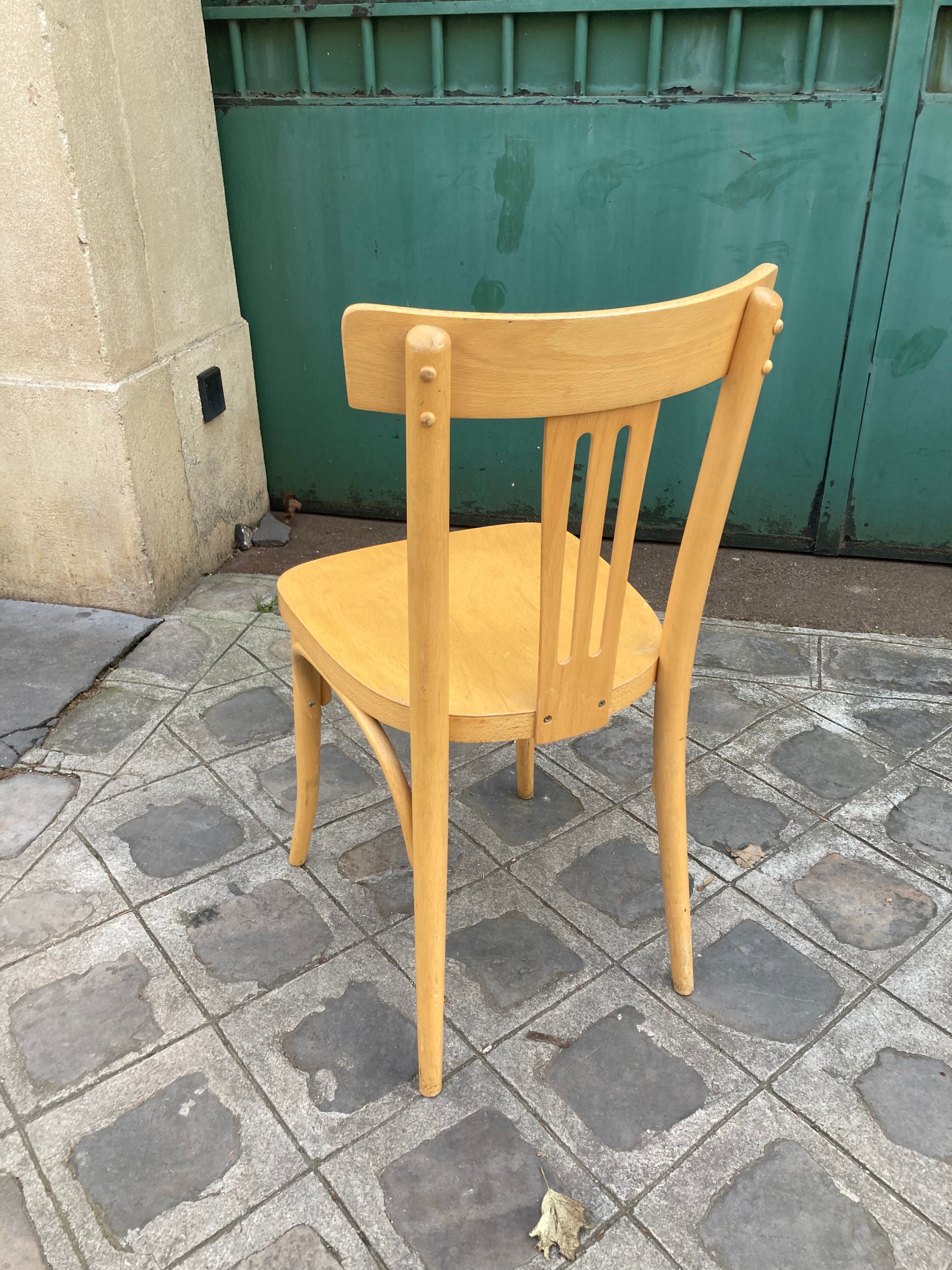 Set of 10 bistro chairs in light beech.